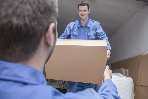 Man with a van loading furniture in Watford street