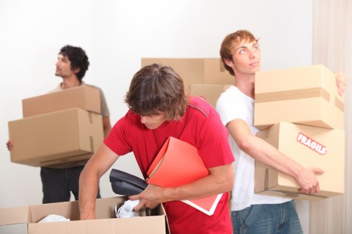Watford Movers crew securing furniture and boxes with care