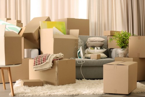 Unpacking household belongings in a Watford property