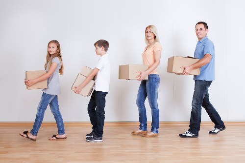 Mover handling fragile items with care during loading