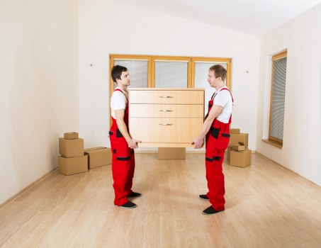 Packed boxes and furniture ready for house removals in Watford
